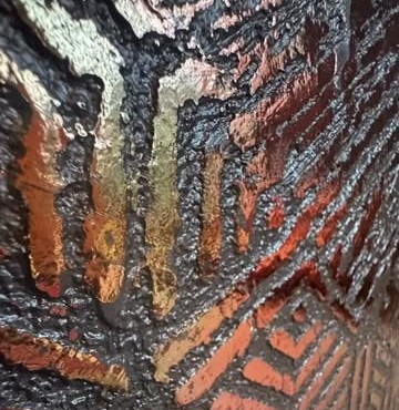 Carved bronze and earth GLO Module